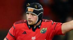 McMillan backs Coombes after groin grab allegation
