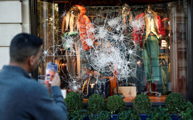 Tensions flare again in Paris as France counts cost of worst unrest in years