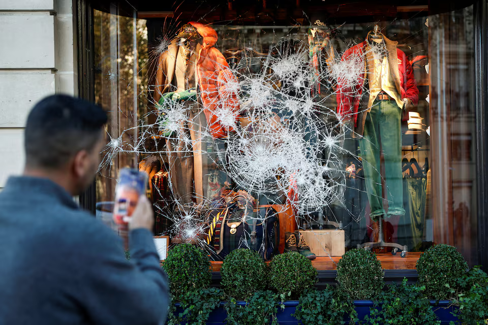 Tensions flare again in Paris as France counts cost of worst unrest in years