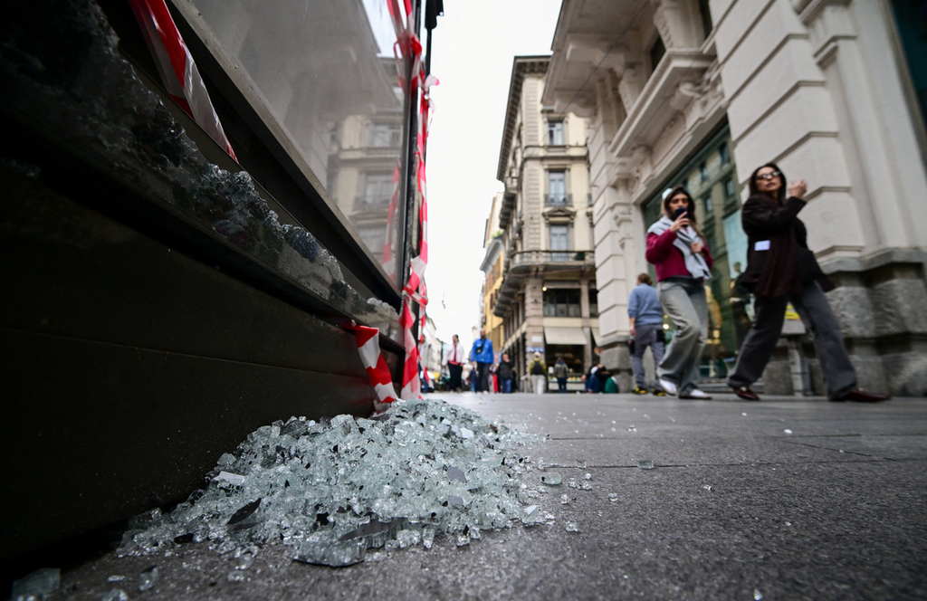 Italian police detain hundreds as stores looted in weekend unrest in Milan