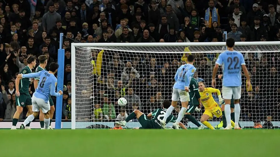 Holders Man City urge past Brighton on penalties