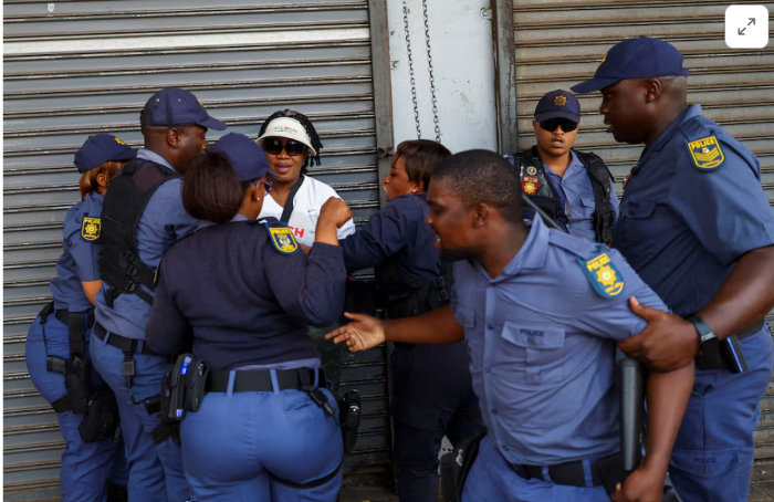 South African police investigate killing of foreign national by crowd